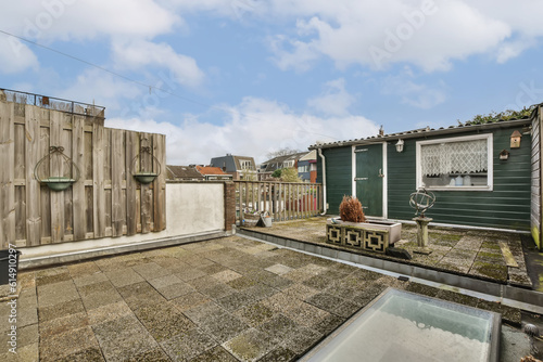 Wallpaper Mural an outside area with some buildings and a blue sky in the photo is taken from the roof of a house Torontodigital.ca