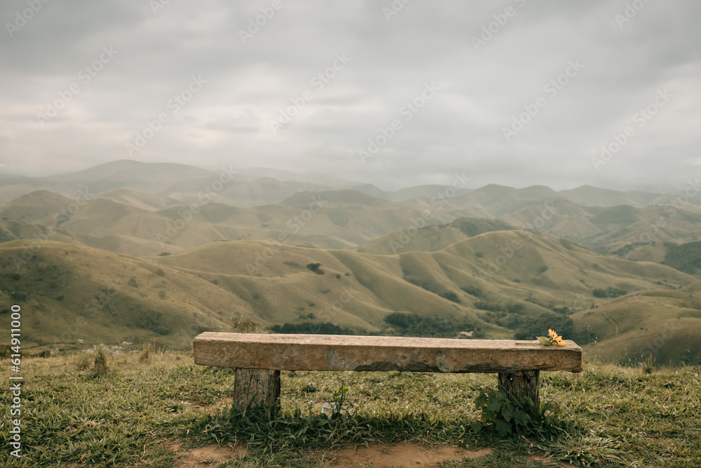 place to sit and admire this beautiful landscape with mountains and skies. Bench in the middle of nature. place to reflect