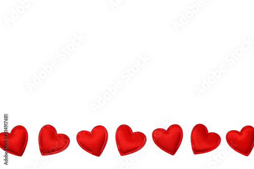 Love concept background with small read hearts isolated on white. Background for a card for Valentine's Day. Banner with hearts and copy space.