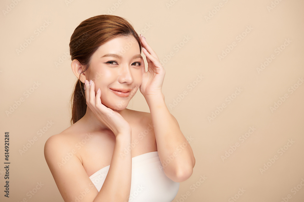 Beautiful young asian woman with clean fresh skin on beige background, Face care, Facial treatment, Cosmetology, beauty and spa, Asian women portrait. Beautiful young asian woman with clean fresh skin on beige background, Face care, Facial treatment, Cosmetology, beauty and spa, Asian women portrait.
