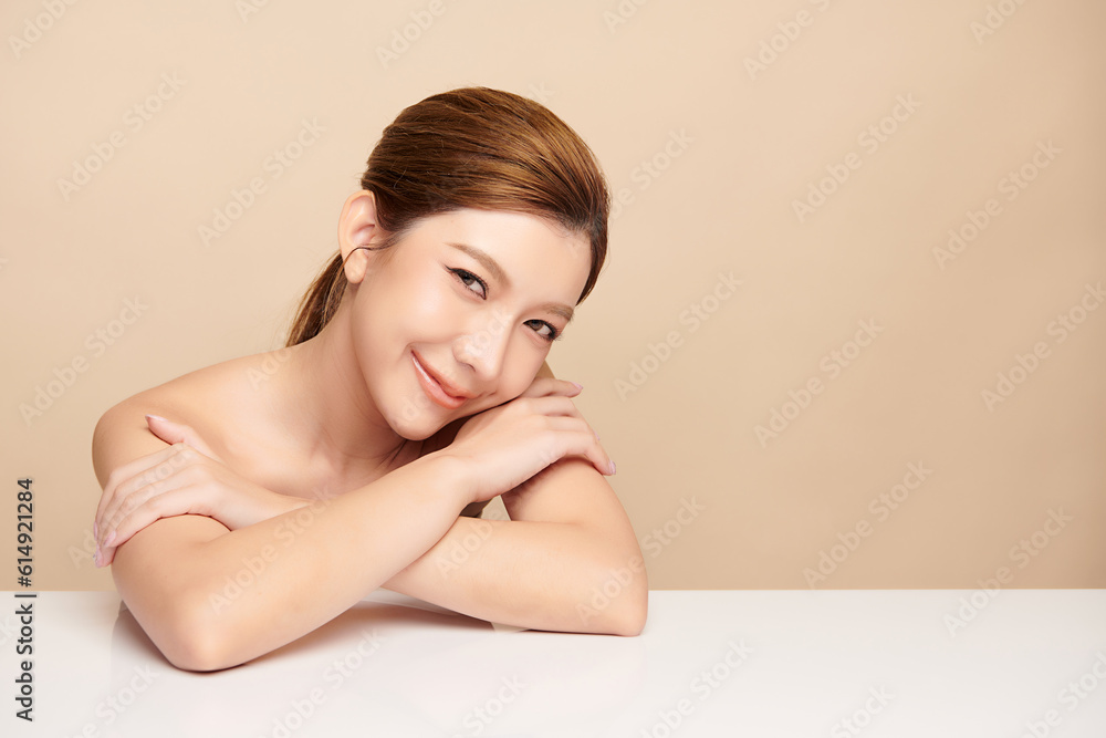 Beautiful young asian woman with clean fresh skin on beige background, Face care, Facial treatment, Cosmetology, beauty and spa, Asian women portrait. Beautiful young asian woman with clean fresh skin on beige background, Face care, Facial treatment, Cosmetology, beauty and spa, Asian women portrait.