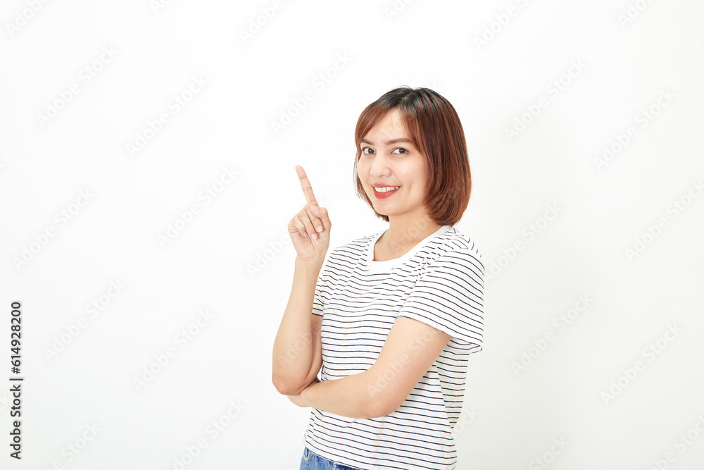 Portrait of smiling attractive asian female in casual t-shirt po Portrait of smiling attractive asian female in casual t-shirt po