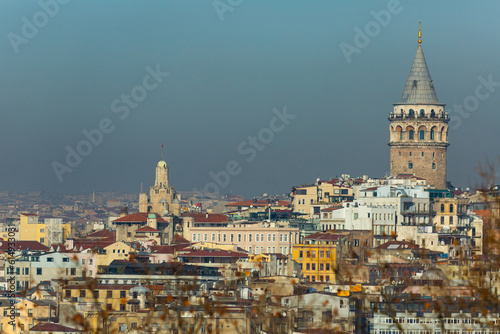 Scenic view of Karakoy quarter and Galata Tower from Golden Horn Bay on winter day, Istanbul, Turkey