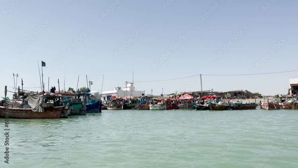 POV Sailing Past Rows Of Fishing Boats Near Damb Beach, Balochistan POV Sailing Past Rows Of Fishing Boats Near Damb Beach, Balochistan