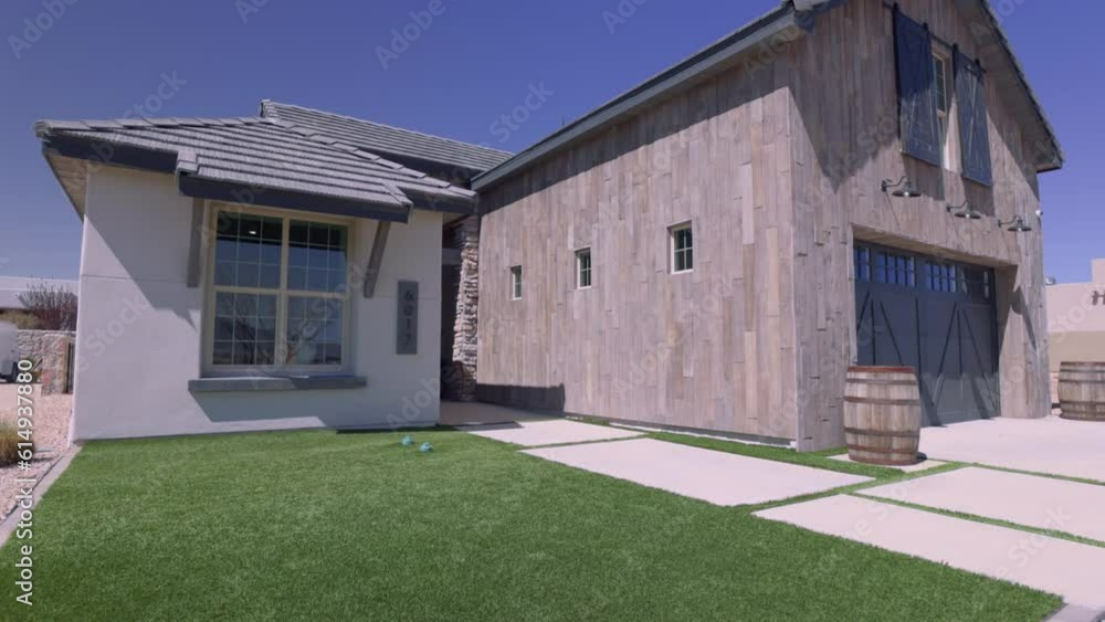 Southwest Barn Style Home Exterior Low Left Angle Tilt Up. view tilting up low left angle front façade of a unique southwestern home exterior Southwest Barn Style Home Exterior Low Left Angle Tilt Up. view tilting up low left angle front façade of a unique southwestern home exterior