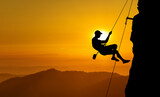 Young man rock climber silhouette, adventure experiences concept
