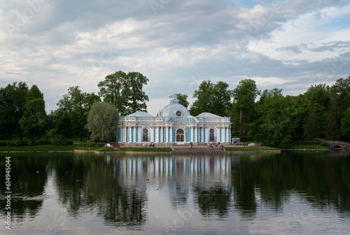 View of the Grotto Pavilion on the shore of the Large pond in the Catherine Park of Tsarskoye Selo on a sunny summer day, Pushkin, St. Petersburg, Russia