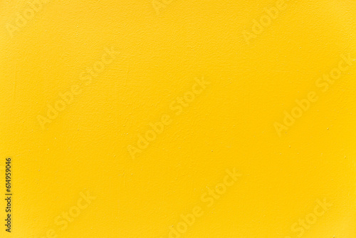 Obraz na płótnie Bright yellow painted metal sheet.Construction and renovation. Background. Space for text. w salonie