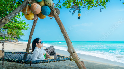 Traveler woman relaxing on net seat joy nature view scenic landscape beach, Leisure time tourist girl travel Phuket Thailand summer holiday vacation trip, Tourism beautiful destination place Asia