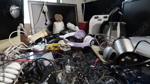 Global e-waste problem and hazard. The growing consumption of electronic goods due to the digital revolution and innovations in science and technology photo
