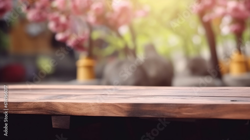 Empty Wooden table in coffee shop of spring time blurred background