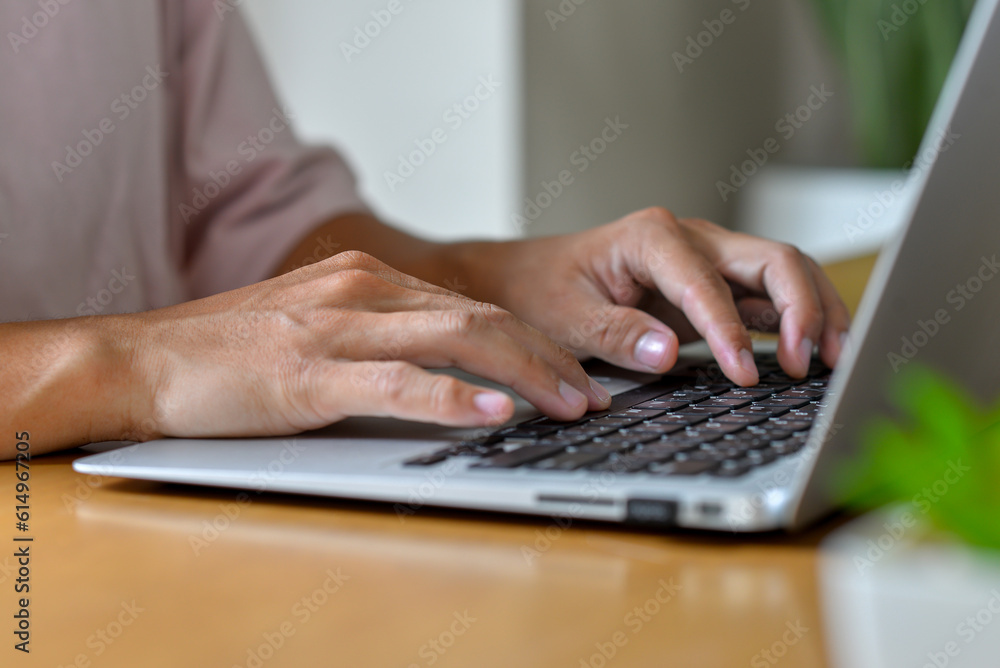 Man working on desk at home office hand on keyboard. Man working on desk at home office hand on keyboard.