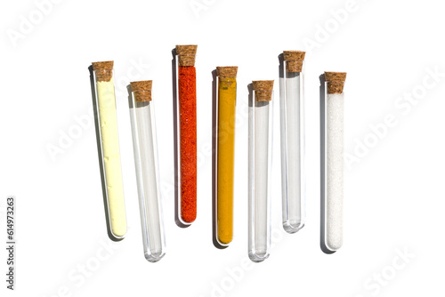 Sulfur Powder  Potassium Ferricyanide  Organic Curcuma Powder and Di-Ammonium Phosphate in test tube with cork cap. Cosmetic chemicals ingredient on laboratory table. Top View