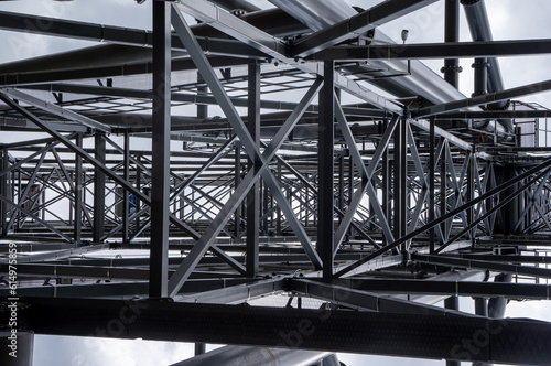 Part of a metal structure made of welded metal beams and pipes