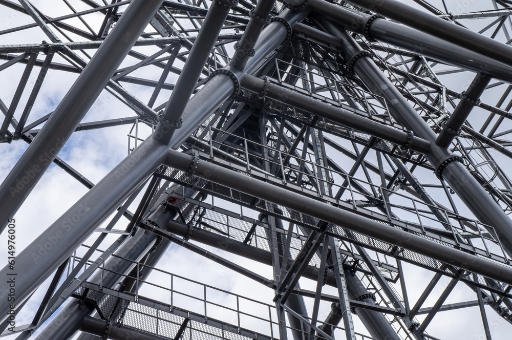 Part of a metal structure made of welded metal beams and pipes Part of a metal structure made of welded metal beams and pipes