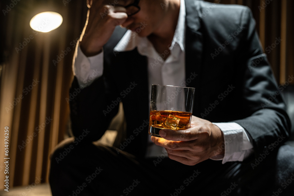 Businessmen in suits drinking  Celebrate whiskey.