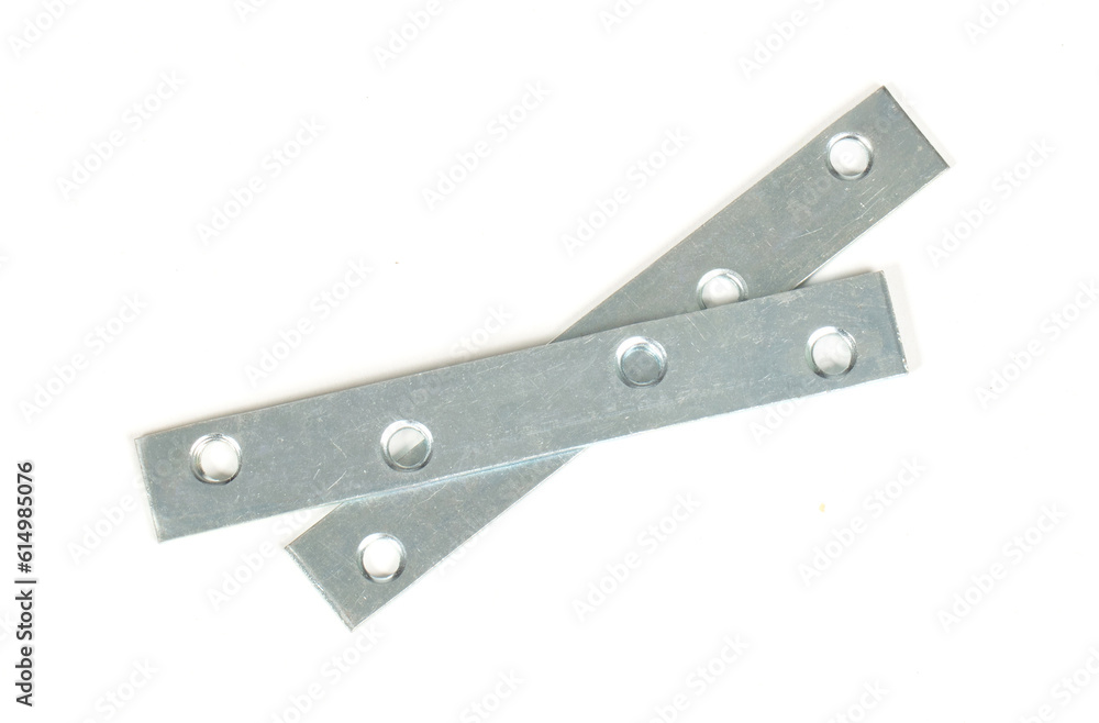 Small metal brackets, isolated on white Small metal brackets, isolated on white