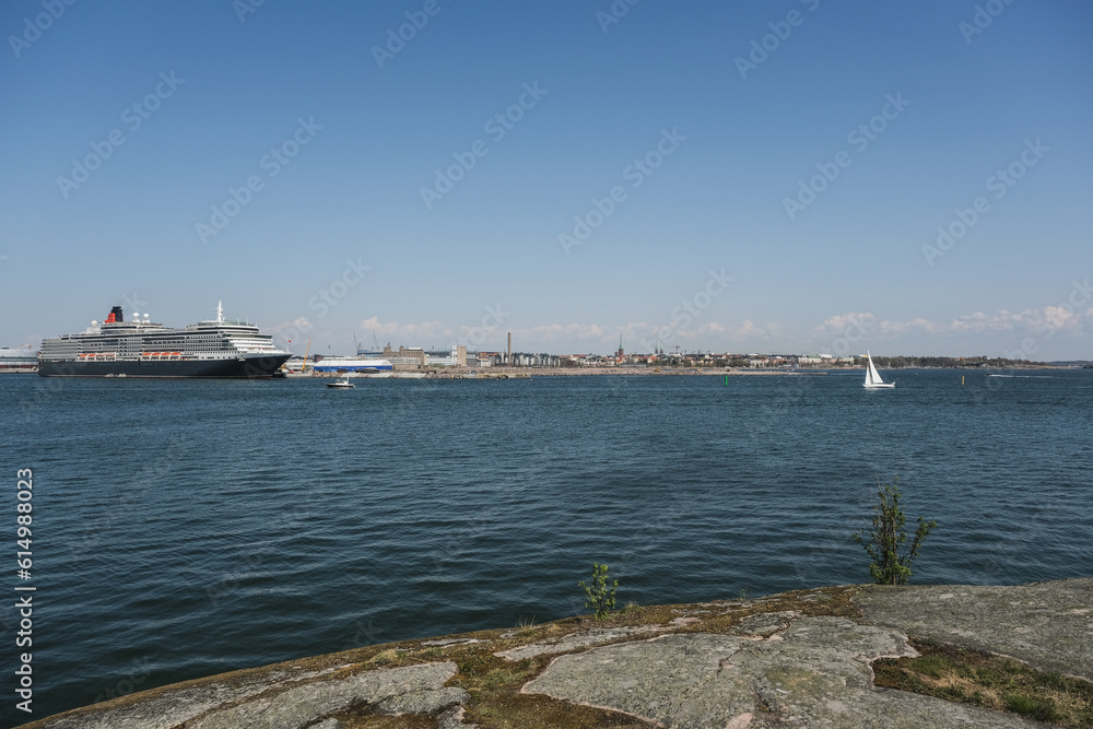 Luxury ocean liner cruiseship cruise ship Victoria or Elizabeth in port of Helsinki, Finland during Baltic cruising with city skyline	