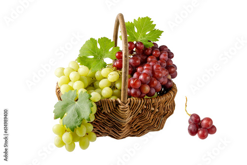 Different mixed red and green grape bunches with leaves in wicker basket isolated on white background.