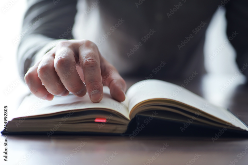Read book. A man sits and reads literature. Textbooks to study. Religion. Read book. A man sits and reads literature. Textbooks to study. Religion.