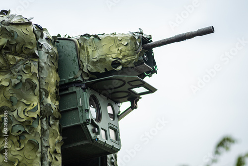 Anti-drone laser system trialed on a Stryker combat military vehicle with a machine gun aimed at the sky in Ukraine during the counteroffensive, NATO response force