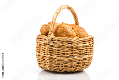 bread in wicker basket isolated on white