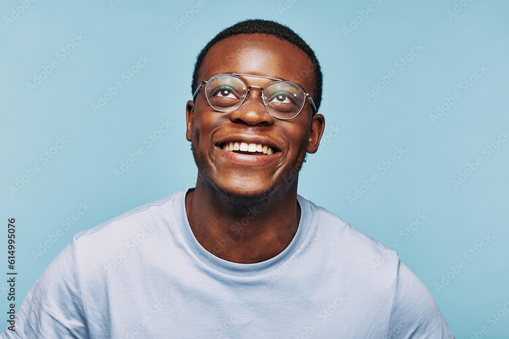 African man looking up and smiling African man looking up and smiling