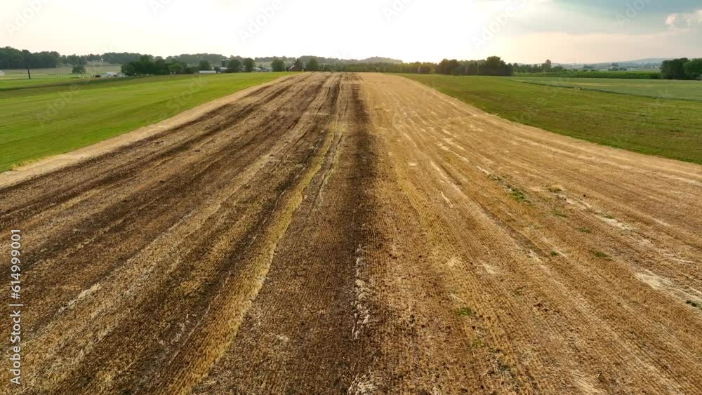 Aerial cinematic shot of a manure spread field Lancaster County. Cow poop used to fertilize field. Aerial cinematic shot of a manure spread field Lancaster County. Cow poop used to fertilize field.
