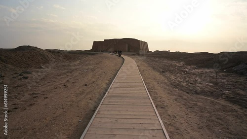 Passway Towards Ruins of UR, Ancient Ziggurat of UR Monument in Iraq at Sunset photo