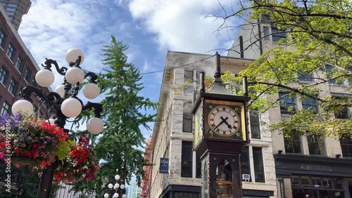 summer flowers clock tourist places in Downtown places must-see attractions Gastown's most famous landmark is its steam-powered clock located on corner of Cambie and Water Street Canada Vancouver 2023 photo