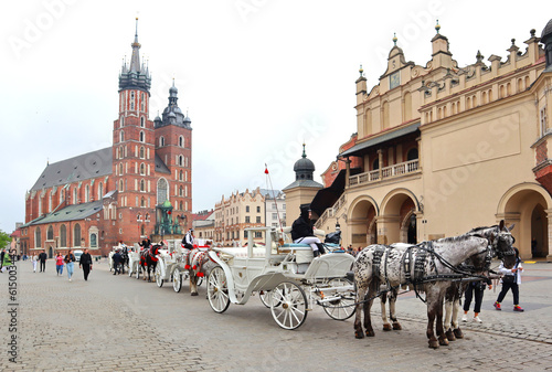 Traditional horse carriage on the Main Market Square in Krakow, Poland