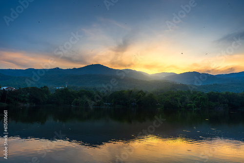 landscape lake views at Ang Kaew Chiang Mai in nature forest Mountain views with evening blue dramatic sunset sky background