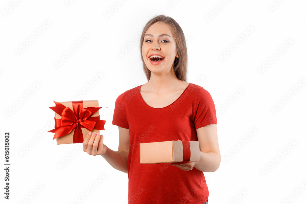 Portrait of a happy smiling girl opened a gift box and posing over white background. International Women's Day, New Year, Christmas, Birthday and Valentine's Day concept celebration Portrait of a happy smiling girl opened a gift box and posing over white background. International Women's Day, New Year, Christmas, Birthday and Valentine's Day concept celebration