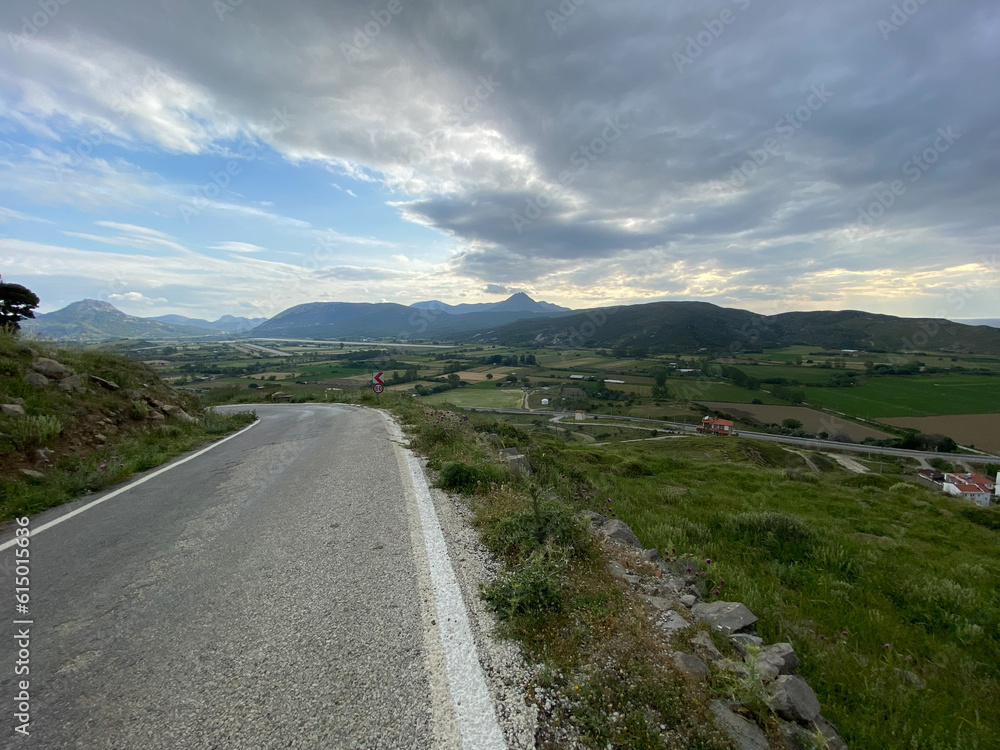 Asphalt road to old Bademli village and nature view