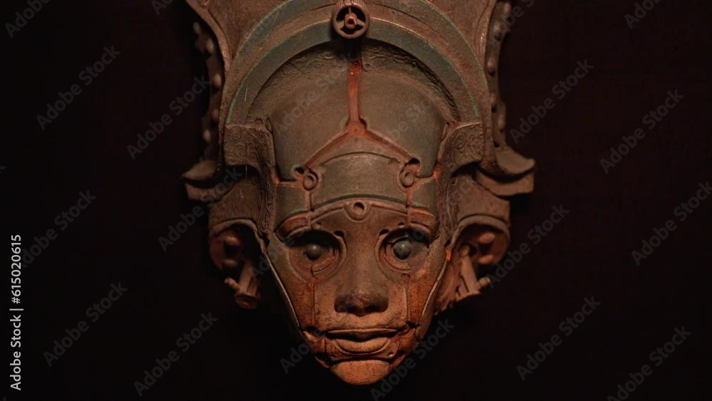 Mysterious and enigmatic face sculpture of ancient deity Mysterious and enigmatic face sculpture of ancient deity