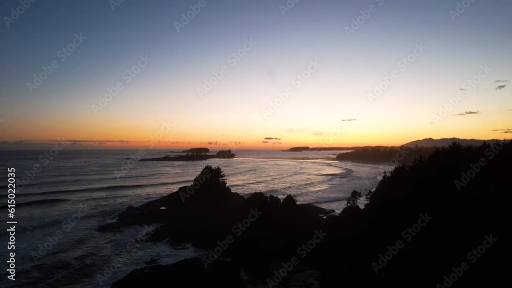 Scenic sunset drone flight over remote Tofino coastline, Vancouver Island Scenic sunset drone flight over remote Tofino coastline, Vancouver Island