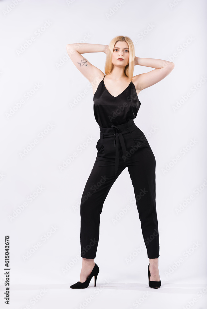 Portrait of an elegant and beautiful blonde girl on a white background Portrait of an elegant and beautiful blonde girl on a white background