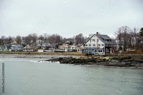 Row of houses on aa New England seascape coastline photo