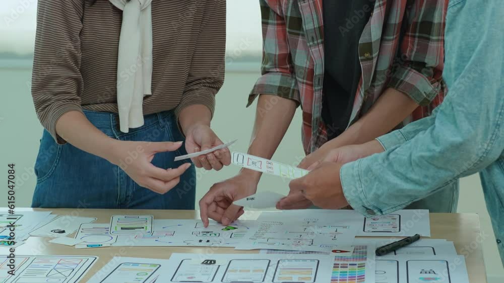 Team of Creative Web, Graphic Designer planning, drawing website ux ui app for mobile phone application and development template layout, process to developing prototype wireframe.
