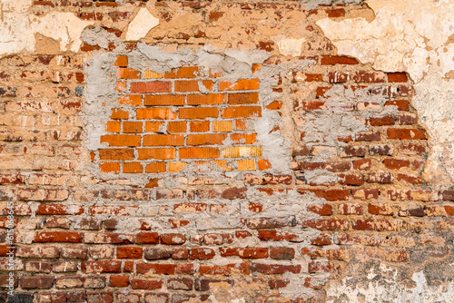 Red brick old shabby wall for background