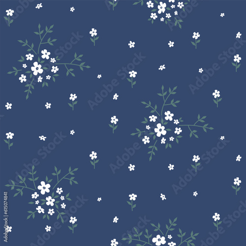 Seamless pattern of white flowers and green leaves on navy background. Floral print