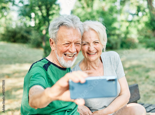 woman man outdoor senior couple happy lifestyle retirement together love elderly video call selfie photo mobile smartphone communication phone sport active fitness outfit training healthy