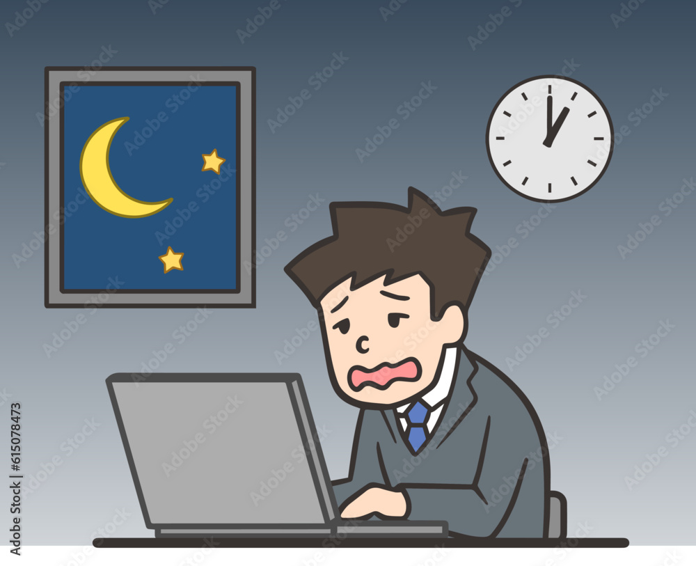 深夜まで残業するスーツを着た会社員の男性 深夜まで残業するスーツを着た会社員の男性