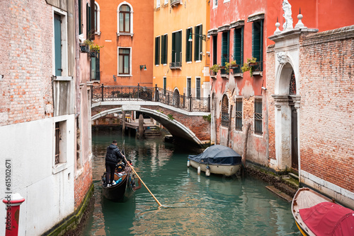 Narrow canal with a bridge in Venice, Italy © Maresol