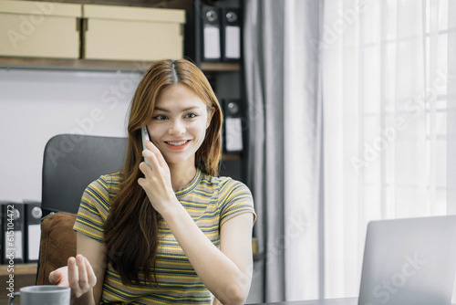 Businesswoman involved in laptop call conversation working on computer, giving professional consultation to client or negotiating project. Free Download Businesswoman involved in laptop call conversation working on computer, giving professional consultation to client or negotiating project. - GFXLoad