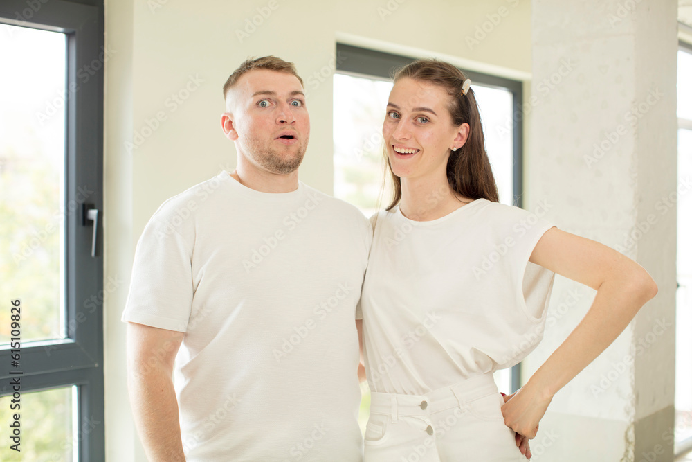 feeling extremely shocked and surprised. young couple concept feeling extremely shocked and surprised. young couple concept