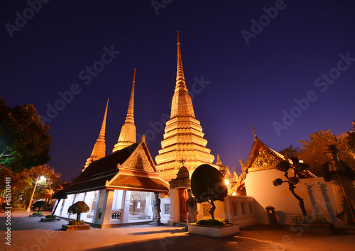 land scape of ancient and old pagoda in history temple, Night time Temple Wat Pho ancient city in Bangkok at night.