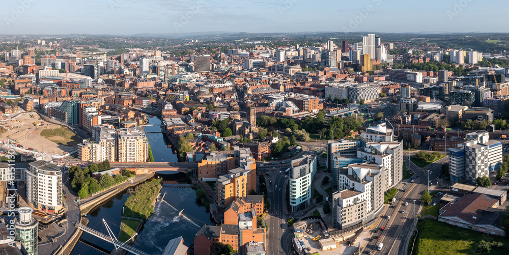Aerial panorama of Leeds city centre and the river Aire in a Leeds cityscape skyline
