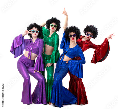 Disco style girls in colorful flared suits and African American wigs on a white background. Seventies or eighties style.