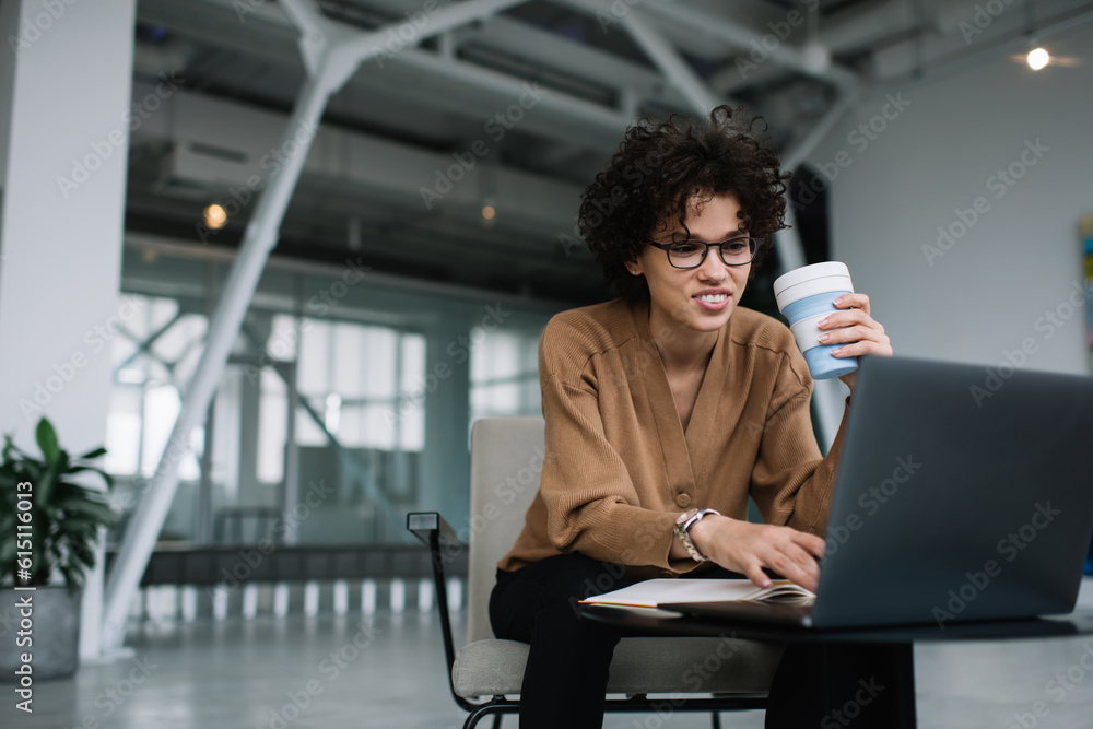 Fototapeta premium Millennial businesswoman work on laptop in office